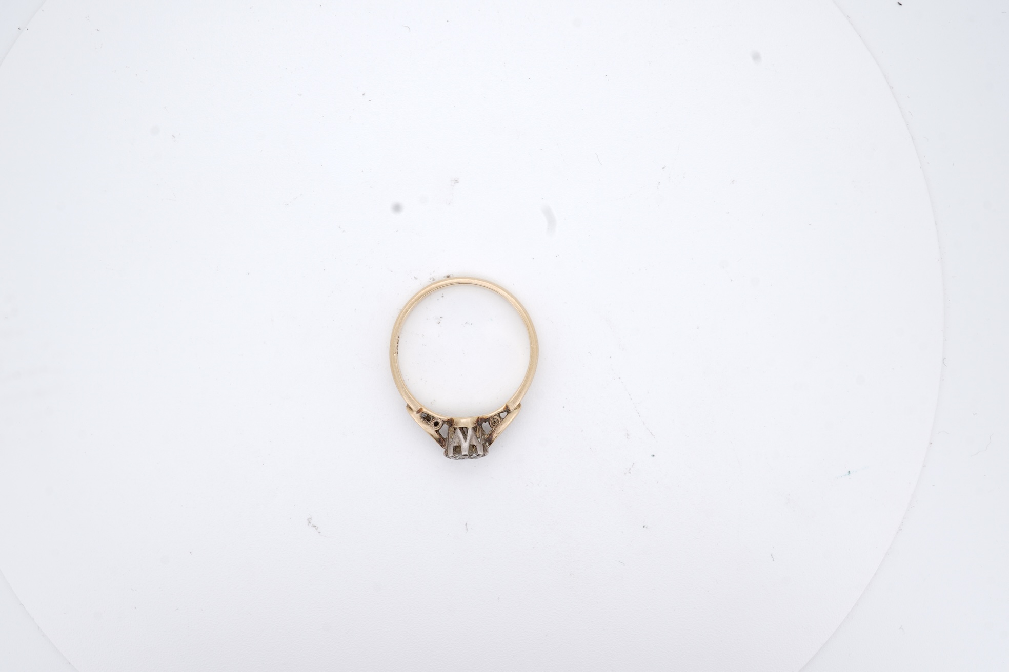 An 18ct and solitaire diamond set ring, the stone weighing approximately 0.30ct, size N, gross weight 2.8 grams.